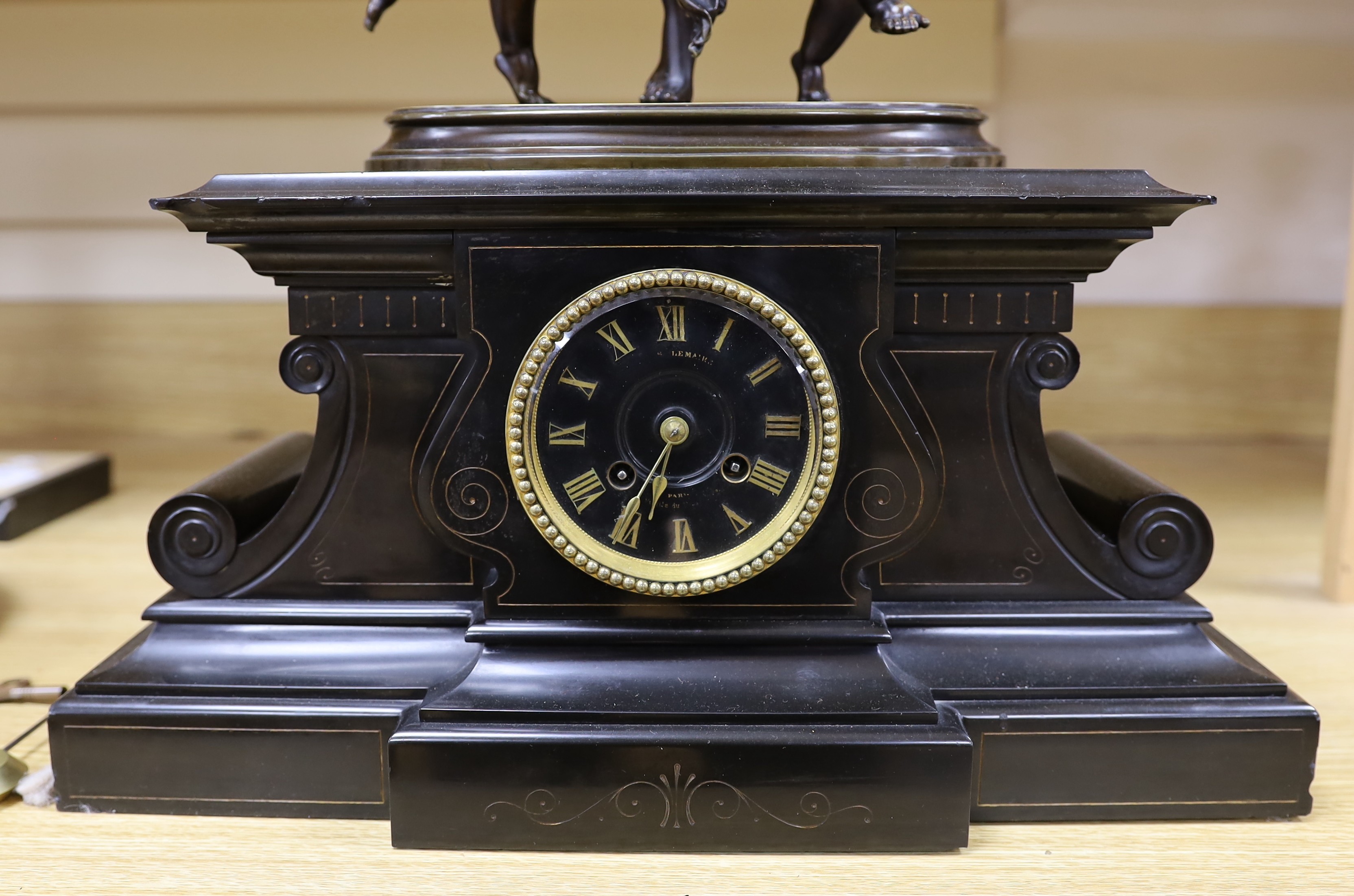 A late 19th century French bronze figural mantel clock, A. Carrier, 66cm